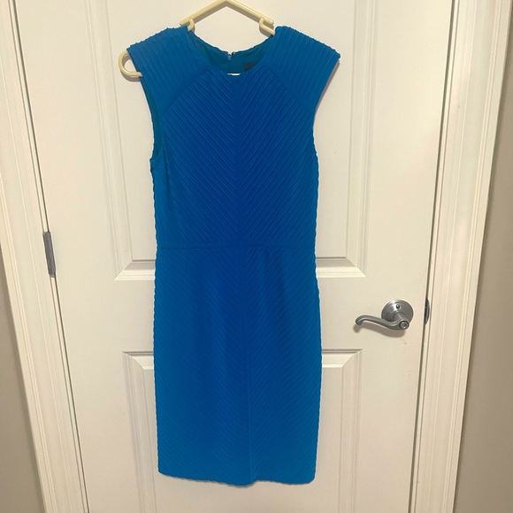 Unique symmetrical pattern on a gorgeous bright rich blue. - Picture 2 of 3